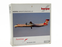 Фото: Модель самолёта Herpa Austrian Arrows Bombardier Q, 5233899712492003318